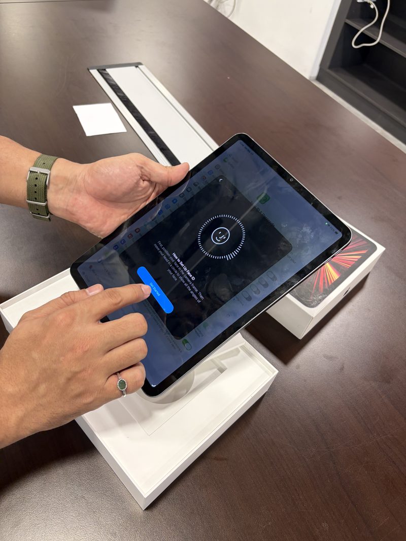 Berry Nice staff entering device details on iPad to generate a quote
